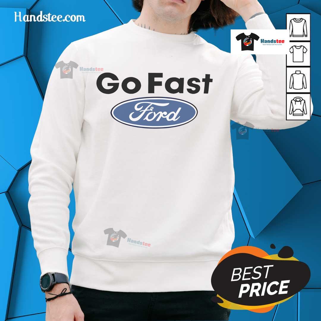 Alt Text: Caitlyn Torres wearing a Go Fast Ford sweatshirt from Nice Motorheads, showcasing stylish automotive fashion.
