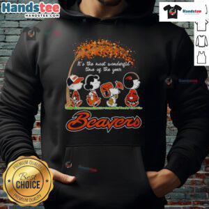 Cozy Nice Oregon State Beavers peanuts fall football Halloween hoodie displayed outdoors with autumn leaves.
