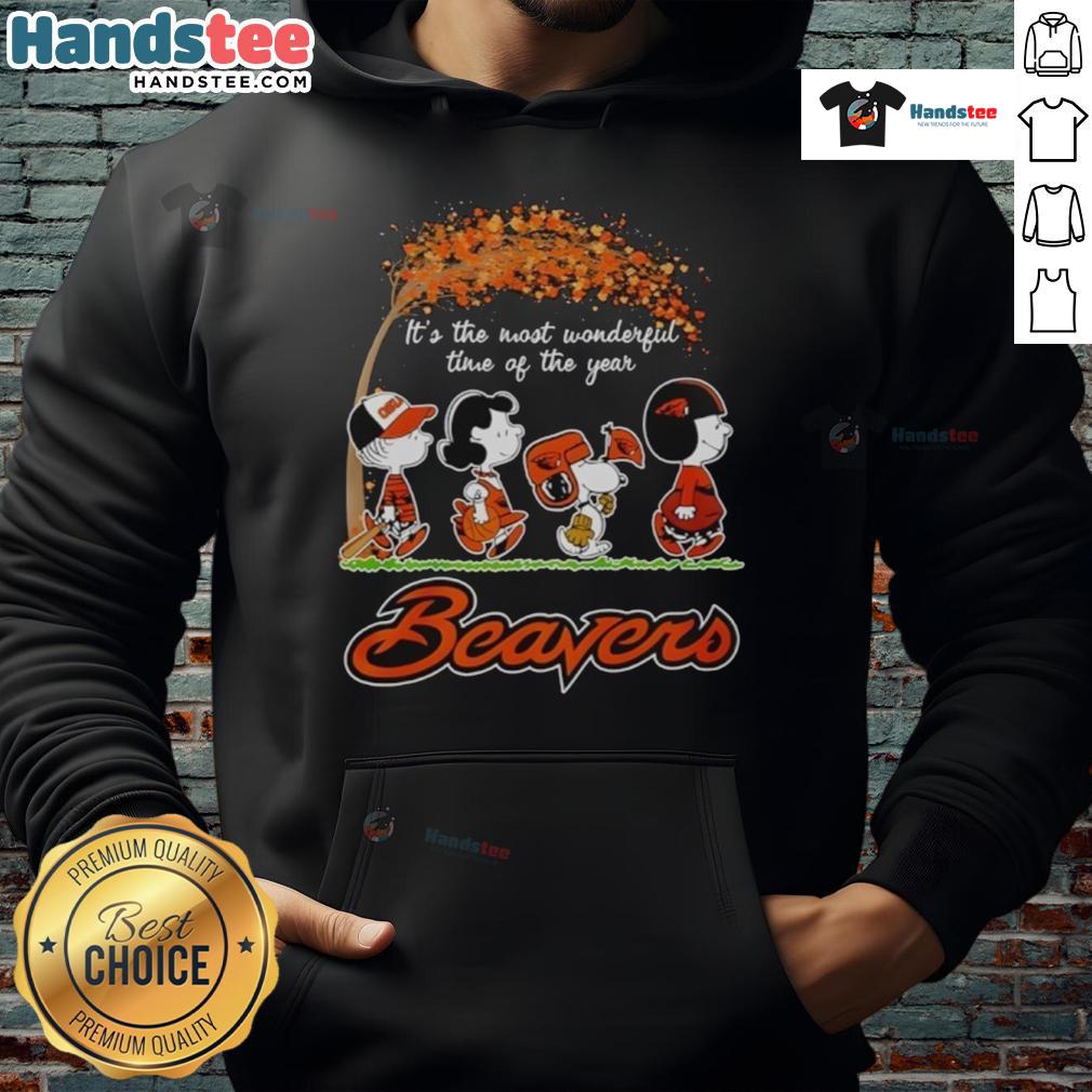 Cozy Nice Oregon State Beavers peanuts fall football Halloween hoodie displayed outdoors with autumn leaves.