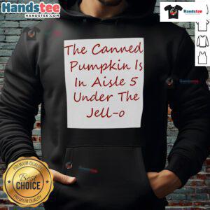 Alt Text: Canned pumpkin in aisle 5, displayed under a Jell-O hoodie at a grocery store.