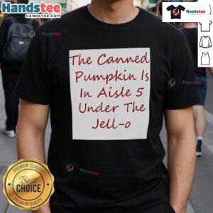 Nice canned pumpkin in aisle 5, located under a colorful Jell-O t-shirt display at the grocery store.