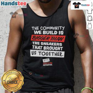 Nice tank top featuring 'The Community We Build Is Bigger Than Us' design, perfect for showcasing unity and togetherness.