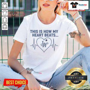 Los Angeles Dodgers ladies tee featuring 'This Is How My Heart Beats' design, perfect for passionate fans and stylish wear.
