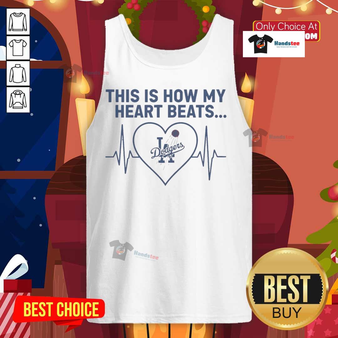 Stylish Los Angeles Dodgers tank top featuring 'This Is How My Heart Beats' graphic, perfect for game day and casual wear.