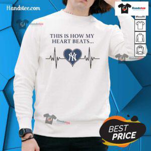 New York Yankees sweatshirt featuring 'This Is How My Heart Beats' design, perfect for fans showing team spirit.