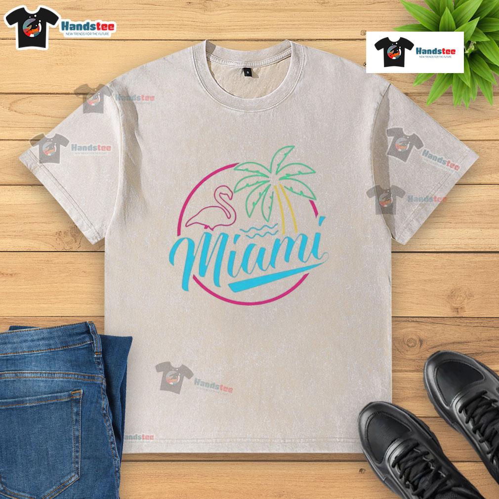 Alt Text: Official Miami Neon Flamingo Logo on a Washed T-Shirt, showcasing vibrant colors and a relaxed, stylish design.