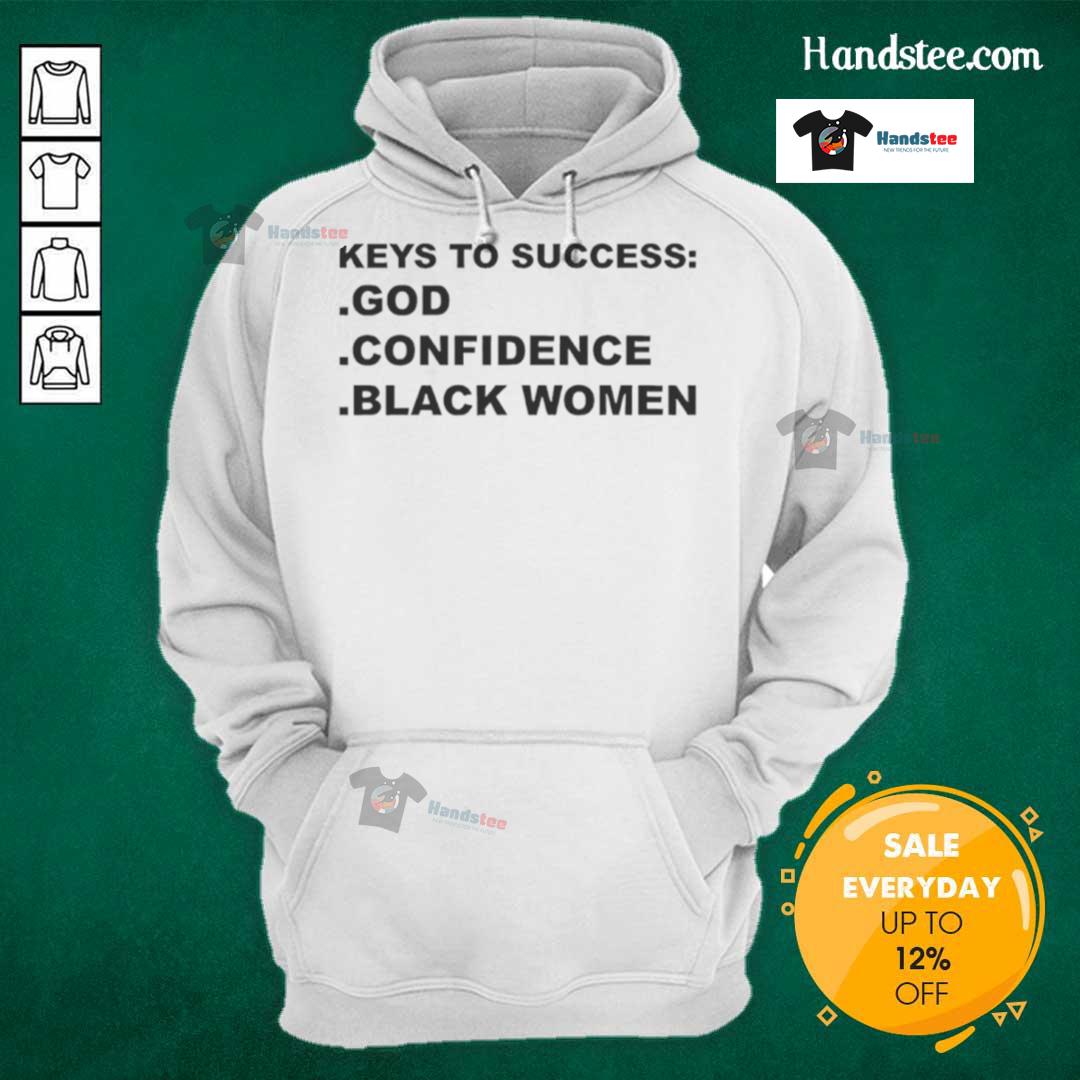 Black women wearing 'Top Keys to Success' hoodie, showcasing confidence and empowerment in urban setting.