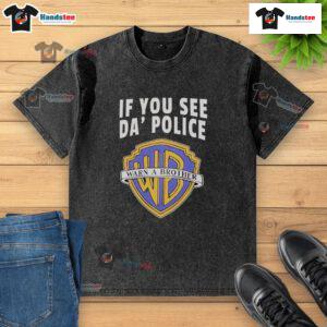 Funny 'If You See Da Police Warn A Brother' WB logo washed t-shirt displayed on a hanger, perfect for casual wear.