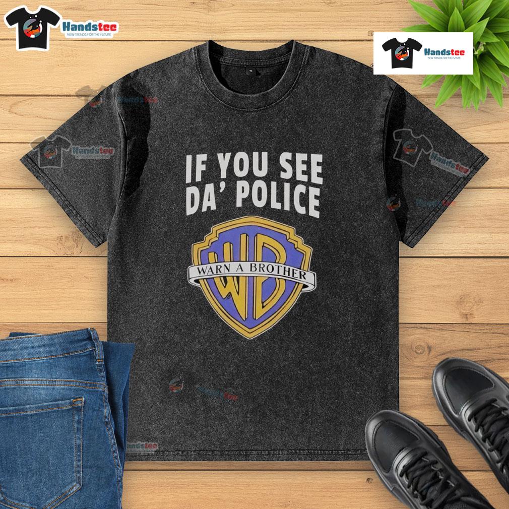 Funny 'If You See Da Police Warn A Brother' WB logo washed t-shirt displayed on a hanger, perfect for casual wear.