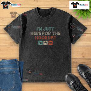 Funny camping t-shirt with 'I'm Just Here For The Hookups' text, perfect for RV camper enthusiasts and outdoor lovers.