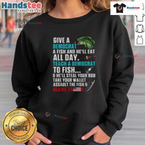 Alt Text: Funny political fishing sweatshirt featuring 'Give a Democrat a Fish, Blame Trump' slogan for humor and satire.