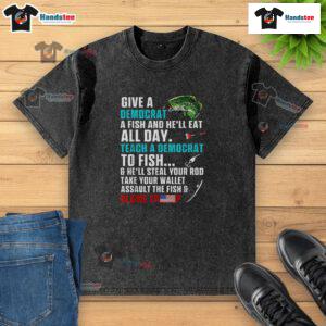 Funny Political Fishing T-Shirt featuring 'Give a Democrat a Fish, Blame Trump' slogan for humorous political apparel.