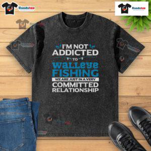 Funny walleye fishing addicted fisherman wearing a washed t-shirt, showcasing his love for fishing humor.