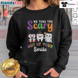 Funny Halloween sweatshirt features 'We Take The Scary Out Of Your Smile' with a playful teeth design for festive fun.