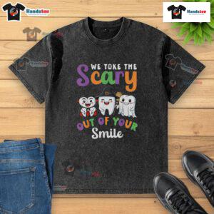Funny Halloween washed t-shirt featuring 'We Take The Scary Out Of Your Smile' with teeth graphic for festive style.