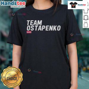 Good Christians Court Team with Ostapenko in Ladies Tee, showcasing unity and sportsmanship in a vibrant outdoor setting.