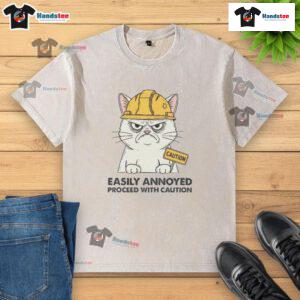 Good Easily Annoyed Process With Caution washed t-shirt design featuring humorous graphics and bold typography.
