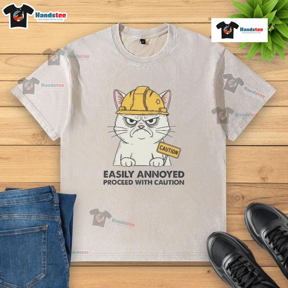 Good Easily Annoyed Process With Caution washed t-shirt design featuring humorous graphics and bold typography.
