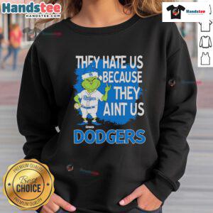 Los Angeles Dodgers Grinch Christmas sweatshirt featuring 'They Hate Ain't Us' design, perfect for holiday sports fans.