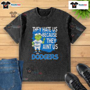 Los Angeles Dodgers Grinch Christmas t-shirt with 'They Hate Ain't Us' design, perfect for festive baseball fans.