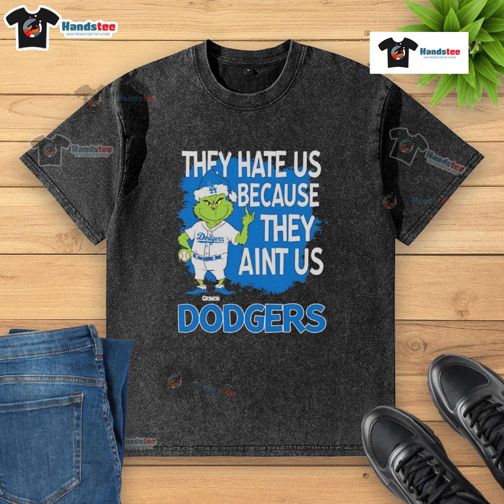 Los Angeles Dodgers Grinch Christmas t-shirt with 'They Hate Ain't Us' design, perfect for festive baseball fans.