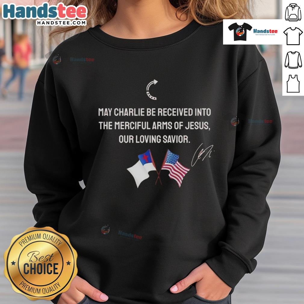 Christian sweatshirt featuring American flag design and text 'Good May Charlie Be Received Into The Merciful Arms of Jesus'.