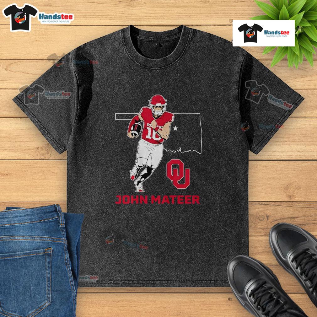 Good Oklahoma Sooners Football John Mateer State Star washed t-shirt displayed on a hanger against a rustic background.