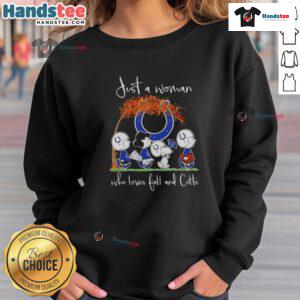 Woman in a cozy sweatshirt featuring 'Good Peanuts' enjoys fall while cheering for the Indianapolis Colts football team.