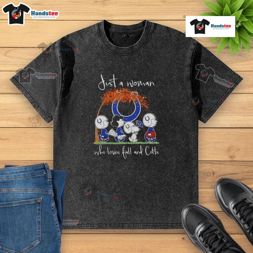 Woman in a washed t-shirt celebrating fall and Indianapolis Colts football, surrounded by autumn leaves.