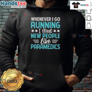 Person wearing 'Good Whenever I Go Running I Meet New People Like Paramedics' hoodie while jogging in the park.