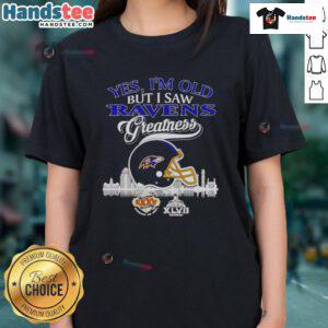 Vintage ladies tee featuring Baltimore Ravens helmet and skyline, celebrating Super Bowl greatness. Perfect for fans!