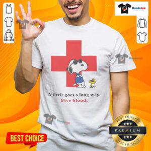 Nice American Red Cross Peanuts Snoopy T-shirt promoting blood donation with 'A Little Goes A Long Way' message.