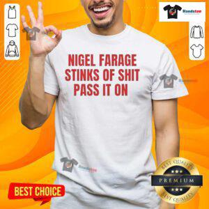 Nice Nigel Farage Stinks Of Shit Pass It On T-Shirt featuring bold text on a casual tee, perfect for humorous activism.