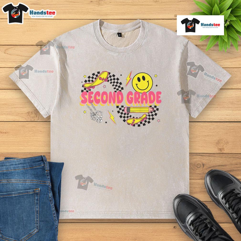 Alt Text: Retro smiley face design on a second-grade back-to-school washed t-shirt featuring a skateboard and pencil.
