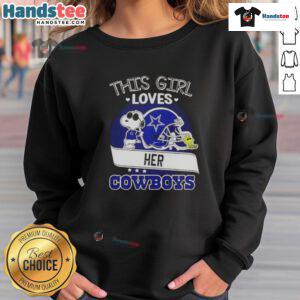 Alt Text: Girl wearing a Dallas Cowboys football helmet sweatshirt with Snoopy design, showcasing her team spirit.