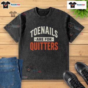Nice Toenails Are For Quitters washed t-shirt design featuring bold text on a casual, trendy shirt.