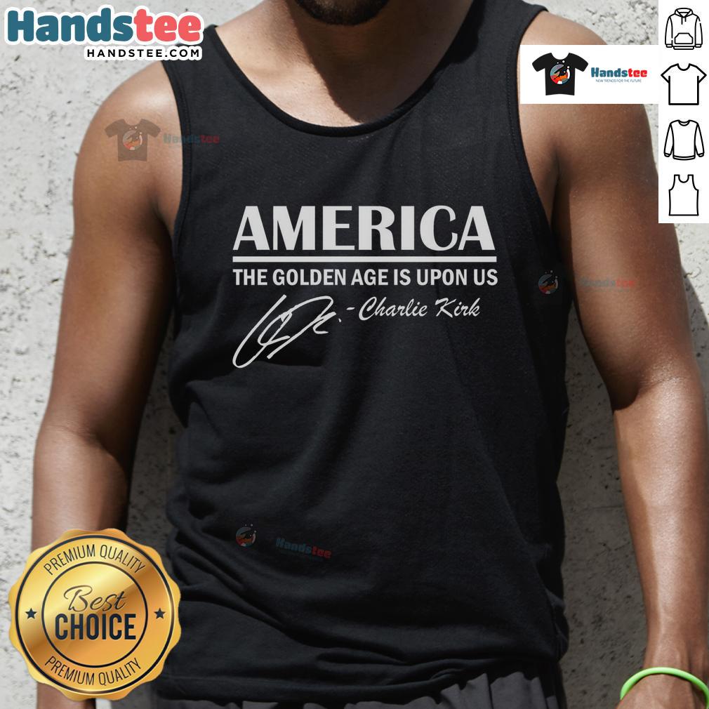 Charlie Kirk wearing an 'Official America: The Golden Age Is Upon Us' tank top, promoting patriotism and activism.