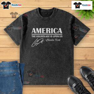Alt Text: Official America The Golden Age Is Upon Us Charlie Kirk washed t-shirt featuring bold graphics and a stylish design.