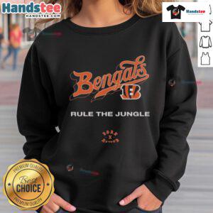 Official Cincinnati Bengals Born x Raised Rule The Jungle Sweatshirt featuring bold team graphics and a comfortable fit.