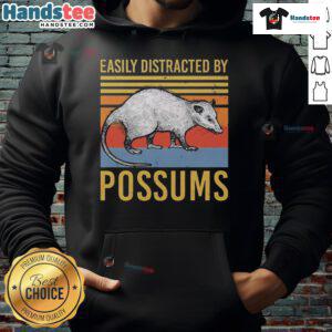 Vintage sunset hoodie with 'Easily Distracted by Possums' graphic, perfect for animal lovers and cozy casual wear.