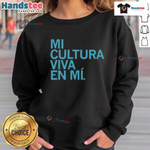 Official Mi Cultura Viva En Mi sweatshirt showcasing vibrant design and cultural pride in a stylish apparel format.