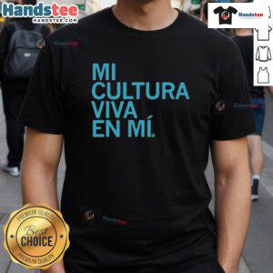 Alt Text: Official Mi Cultura Viva En Mi T-Shirt featuring vibrant colors and cultural designs, perfect for celebrating heritage.