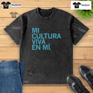 Official Mi Cultura Viva En Mi washed t-shirt featuring vibrant colors and stylish design for cultural pride.
