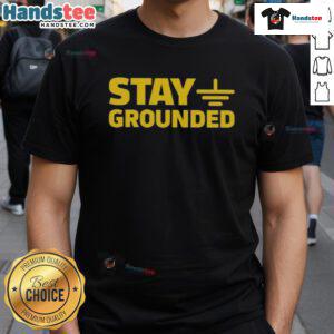 Official Stay Grounded T-Shirt featuring a stylish design and comfortable fit, perfect for eco-conscious fashion lovers.