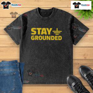 Official Stay Grounded Washed T-Shirt in soft cotton, featuring a relaxed fit and vintage-inspired design for casual style.