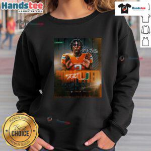 De Marcus De Roche in Miami Hurricanes sweatshirt, showcasing commitment to team spirit and athletic pride.