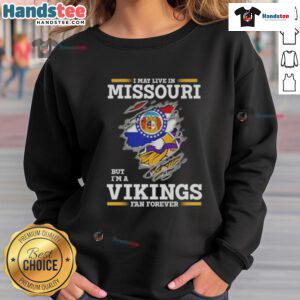Premium sweatshirt featuring 'I May Live In Missouri But I'm A Minnesota Vikings Fan Forever' design for fans.