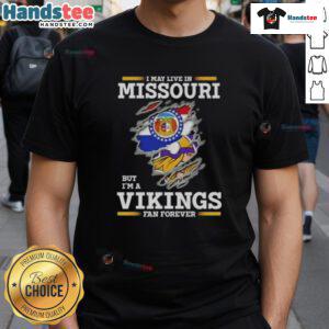 Premium I May Live In Missouri But I'm A Minnesota Vikings Fan Forever T-Shirt featuring bold team colors and graphics.