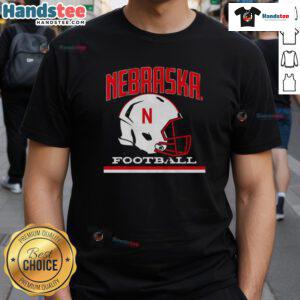 Vintage Nebraska Cornhuskers basketball helmet t-shirt featuring classic design and team colors for fans and collectors.