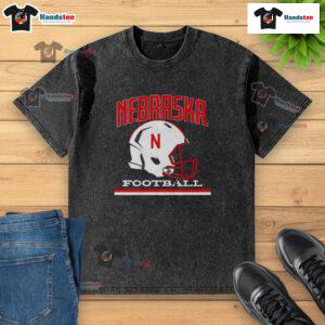 Vintage washed t-shirt featuring the Nebraska Cornhuskers basketball helmet design, perfect for fans and collectors.